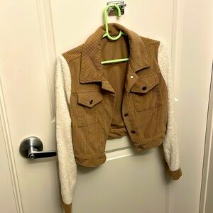Brown and white soft corduroy jacket! Size small in new condition.